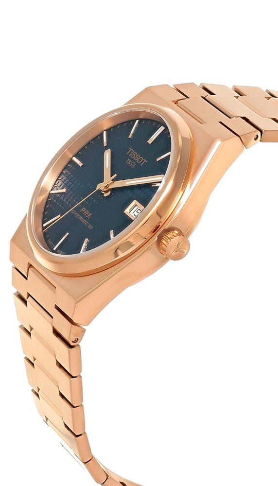 Vista lateral del reloj Tissot PRX Powermatic 80 de 40 mm en acero con PVD oro rosa
